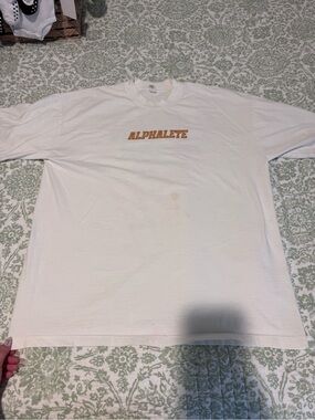 Alphalete Men's White Tee with Gold Chest Logo